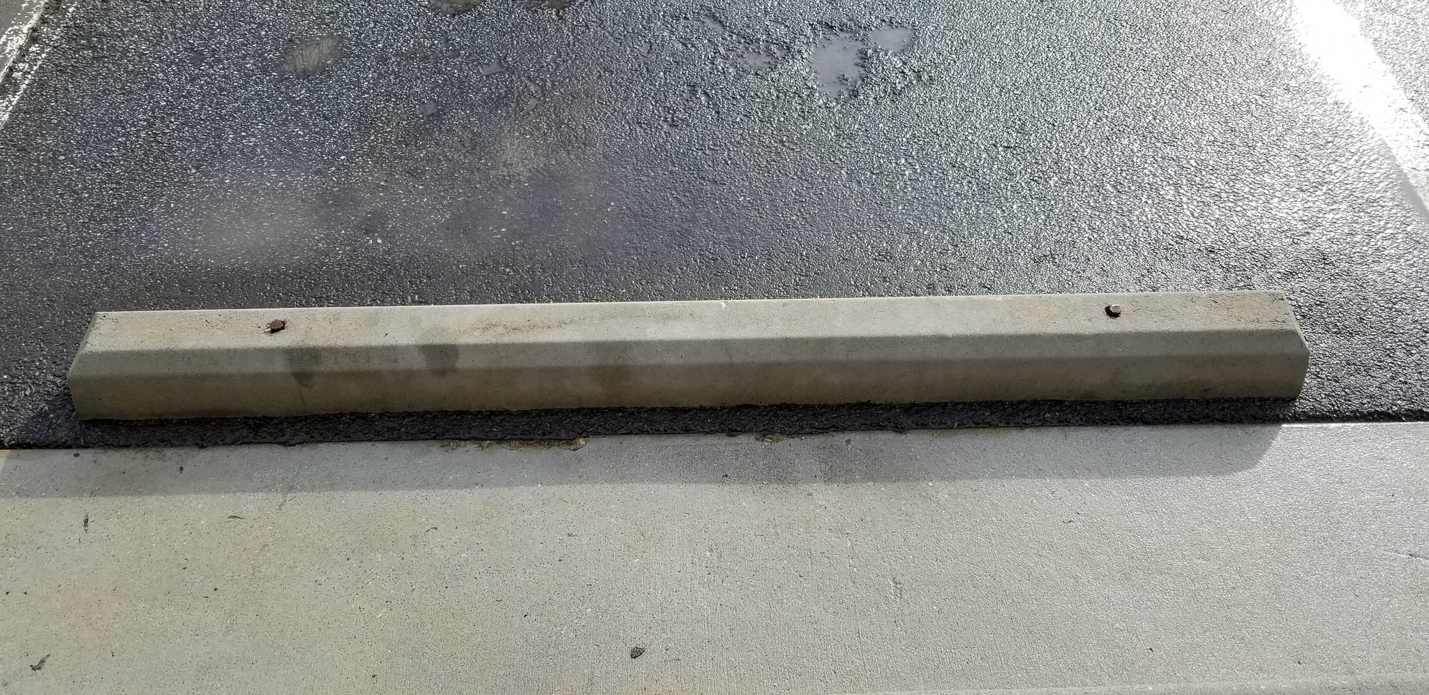 After pressure washing parking lot